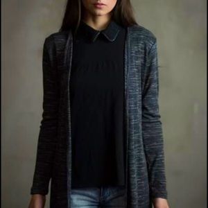 Small black sleeveless collared shirt